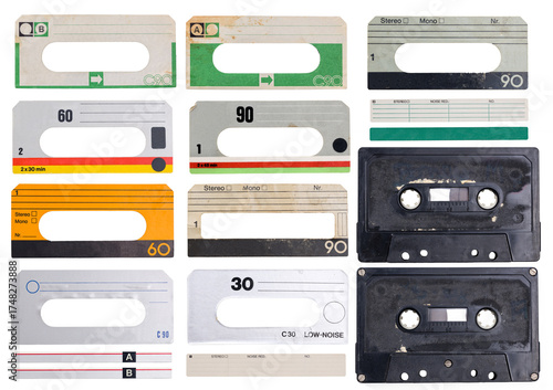 Collection of different paper labels for vintage music cassette audio tapes isolated on transparent background. The labels show signs of wear and have a lot of grunge stains and scratches. 