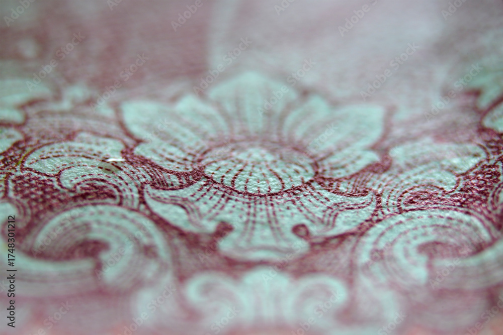 Obraz premium Close-Up of Intricate Floral Design on Decorative Paper Surface