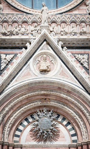 Detail of facade of Siena Cathedral (Duomo di Siena), Siena, Italy