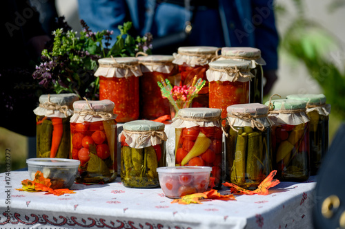 Schilderij op canvas Close-up of autumn preparations and preserves in glass jars.