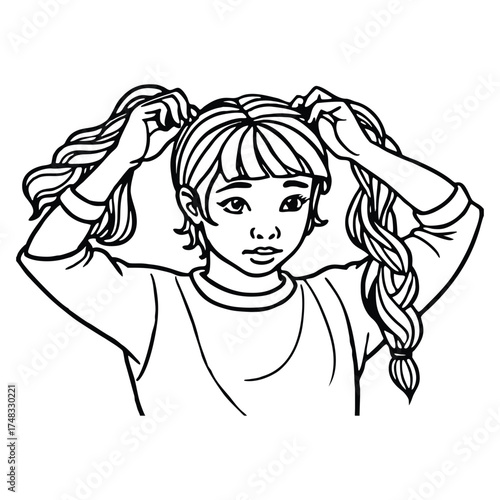 Girl tying her hair neatly