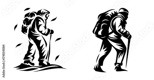 Two silhouette hikers with backpacks and trekking poles capturing autumn adventure and outdoor exploration