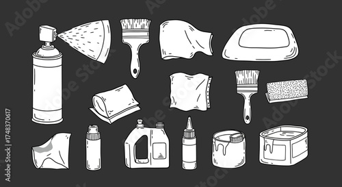 Monochrome cleaning supplies collection on dark background