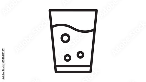 Refreshing glass of bubbly water with floating bubbles