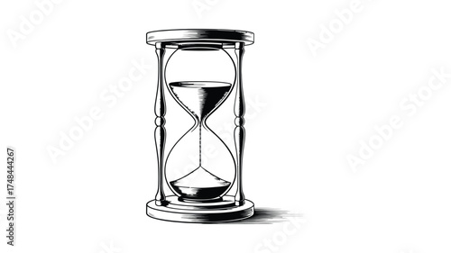 Vintage hourglass with sand flowing through the narrow middle section on a white background