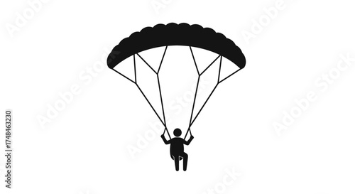 Black Silhouette of a Person Parachuting with Open Canopy.