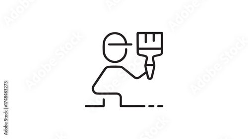 Creative person holding a paintbrush, ready to paint or create art