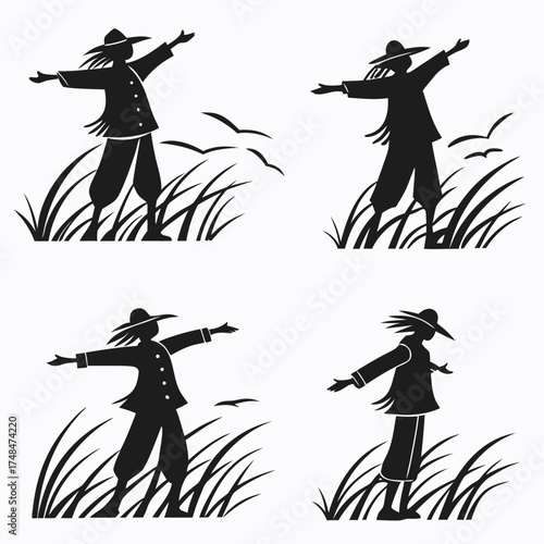 Four black silhouette scarecrows in grass with birds