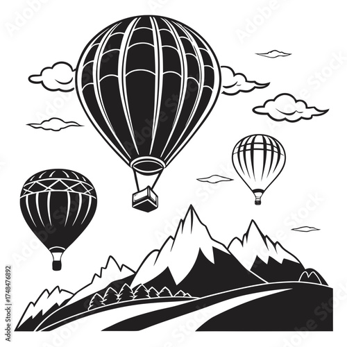 Four black hot air balloons over mountain landscape