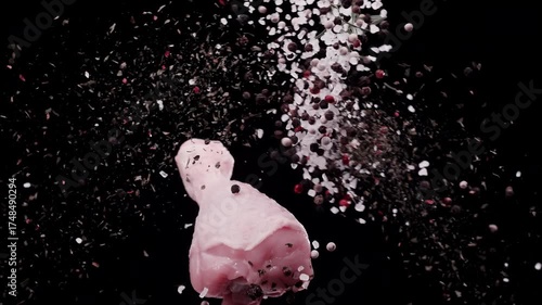 The collision of spices with a chicken drumstick in the air at super slow-motion 1000fps