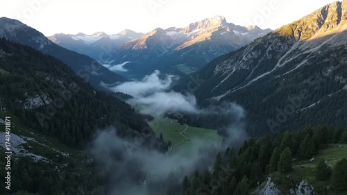 Breathtaking Mountain Valley Scenery with Clouds and Forest.