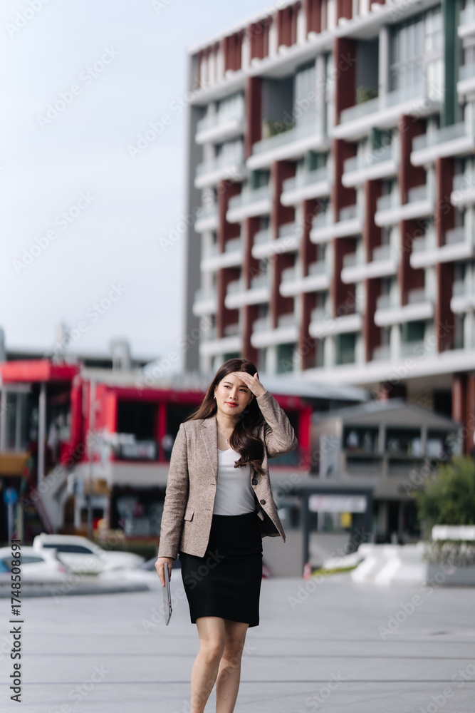Fototapeta premium Confident Businesswoman Walking in City