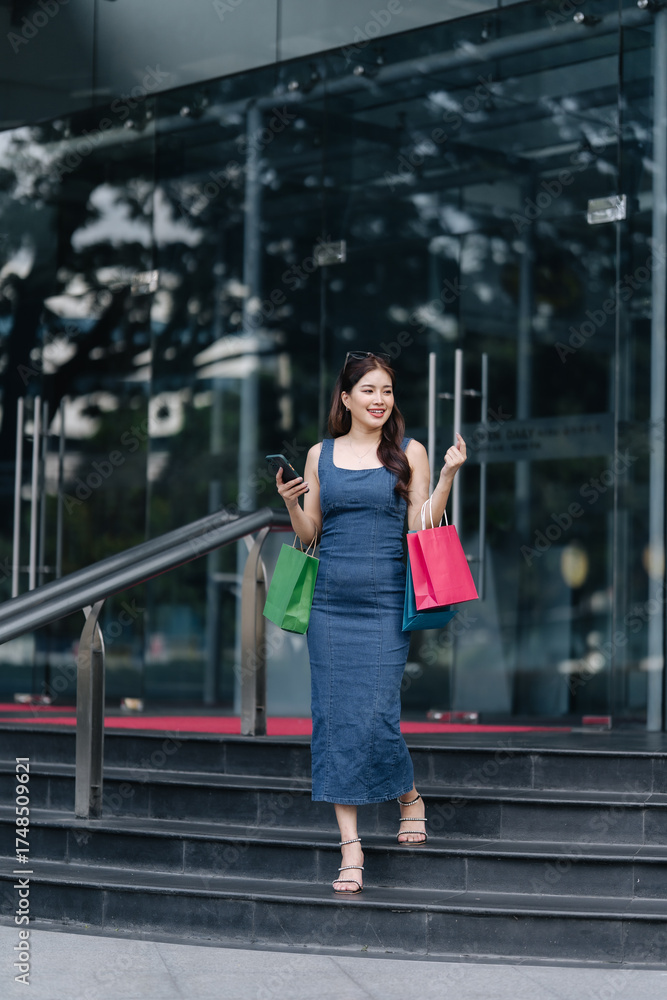 Fototapeta premium Asian beautiful woman shopping goods outdoor alone in department store.