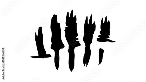 Silhouette illustration of five dark abstract shapes resembling primitive weapons or tribal markings