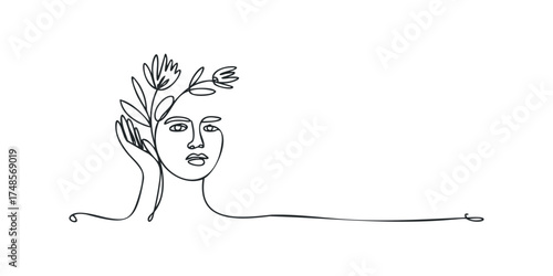 One line drawing of a woman's face with flowers