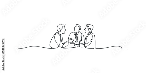Three men in suits at a table discussing