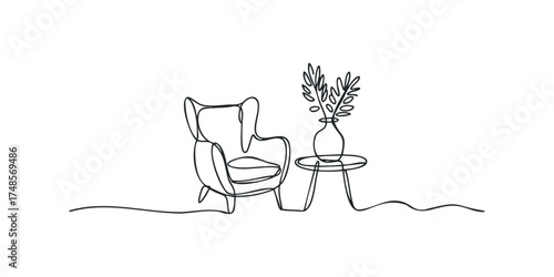 Minimalist furniture arrangement with vase and plant