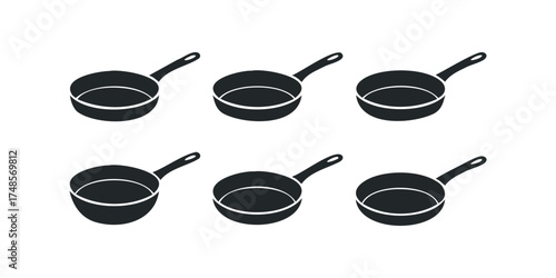 Six black cooking pots with handles isolated on white background