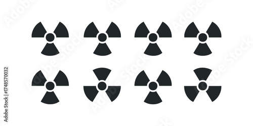 Eight Radiation Symbols Scattered on White Background
