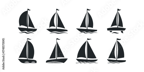 Collection of eight black sailboat silhouettes on white background