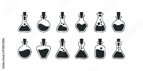 Collection of assorted potion bottles with cork stoppers and liquid