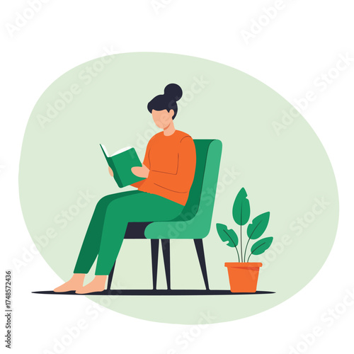 Woman reading a book in a chair next to a potted plant.
