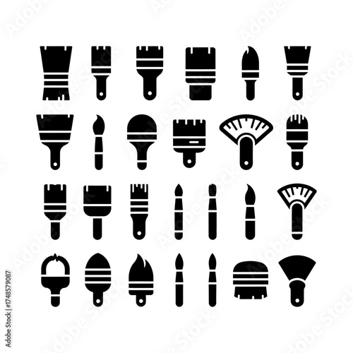 Collection of black and white paintbrushes of various shapes and sizes on a white background silhouette