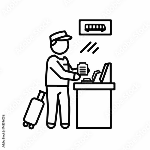 Traveler purchases ticket at station counter with luggage nearby
