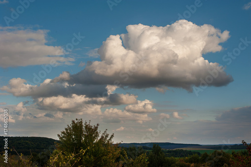 sky with cumulus clouds, space above a landscape