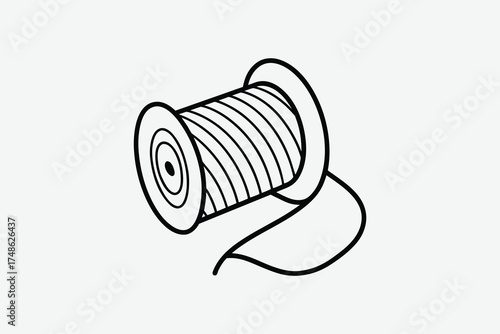 Simple black and white drawing of a spool of thread silhouette