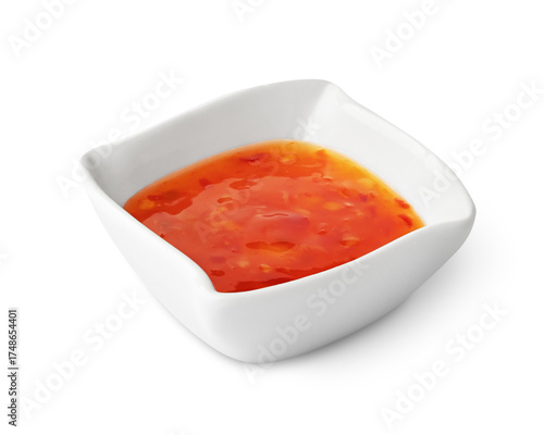 Sweet chilli sauce in bowl isolated on white background