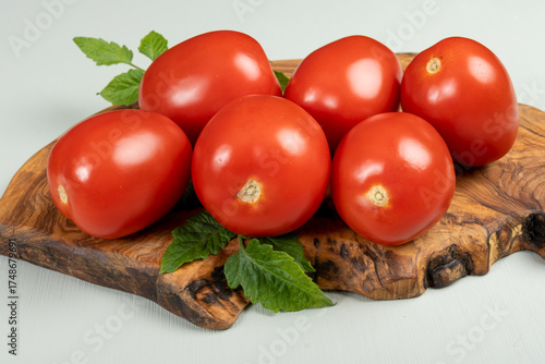 Red ripe roma tomatoes used for pasta sauce or tomatpes sauce in Italian cuisine