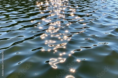 Sun-dappled lake water shimmers with vibrant reflections, creating a mesmerizing pattern of light and shadow on the tranquil surface, light, summer, ripple
