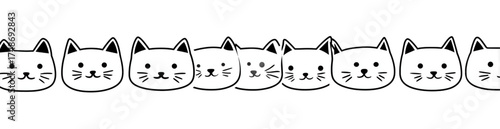 Seamless border of cute hand-drawn cartoon cat faces.