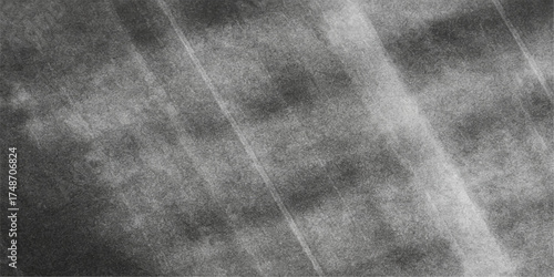 Old vintage black grunge leather texture wall with rough gray concrete surface backdrop design