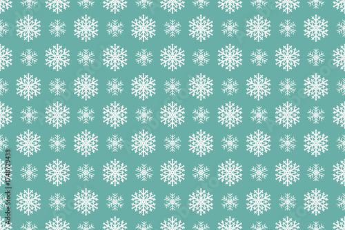 Seamless pattern of white snowflakes on a soft blue background, perfect for winter themes, festive designs, or serene decorative elements.