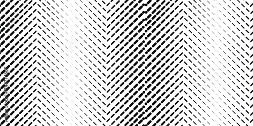 Abstract black and white zigzag pattern with varying line density, creating a visual texture.