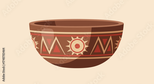 A beautifully decorated ancient ceramic bowl with intricate geometric patterns and a sun motif.