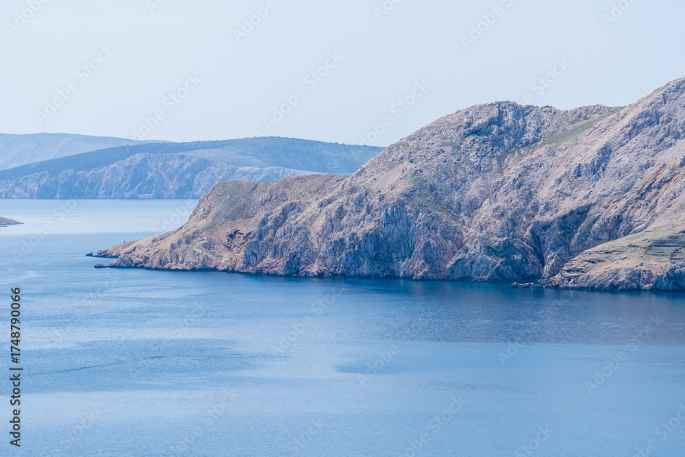 Obraz premium Prvić Island and Sveti Grgur, Croatia - April 20, 2025: Panoramic view of the mountains and sea.