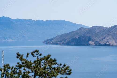 Prvić Island and Sveti Grgur, Croatia - April 20, 2025: Panoramic view of the mountains and sea.