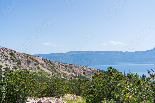 Prvić Island and Sveti Grgur, Croatia - April 20, 2025: Panoramic view of the mountains and sea.
