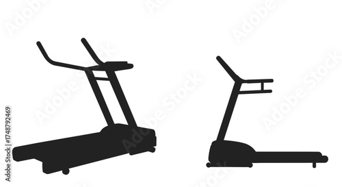 Two modern black treadmills presented in a simple minimalist studio setting