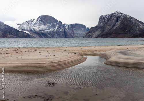 Sandy beach arctic with mountain