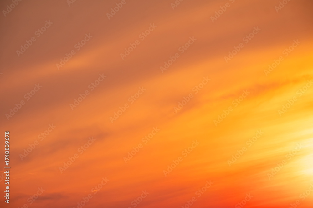 Fototapeta premium Beautiful , luxury soft gradient orange gold clouds and sunlight on the blue sky perfect for the background, take in evening,Twilight, Large size, high definition landscape photo