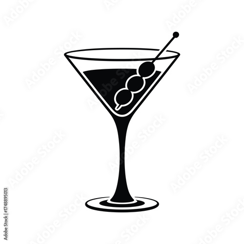 Classic martini cocktail with olives in a stemmed glass