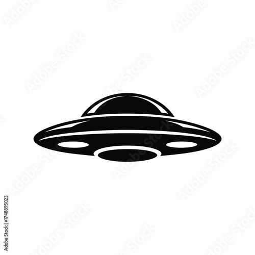 Black silhouette of a classic flying saucer ufo