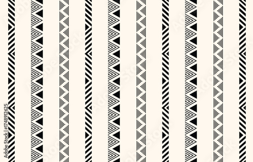 Ethnic tribal african black and white vertical stripe background. Seamless tribal pattern, folk embroidery,  geometric ornament. Traditional design for fabric, textile, rug, paper, carpet
