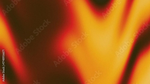 Retro dark orange hues abstractly blend with blurred yellow, black, and orange colors. Suitable for vintagethemed designs and backgrounds.