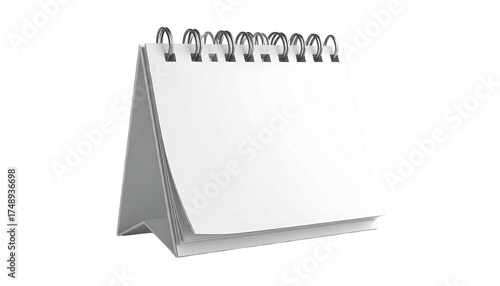 White desk calendar with spiral binding, standing on a black background