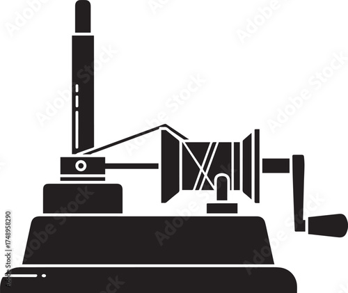 Black silhouette of a vintage thread winder with spindle and crank handle.